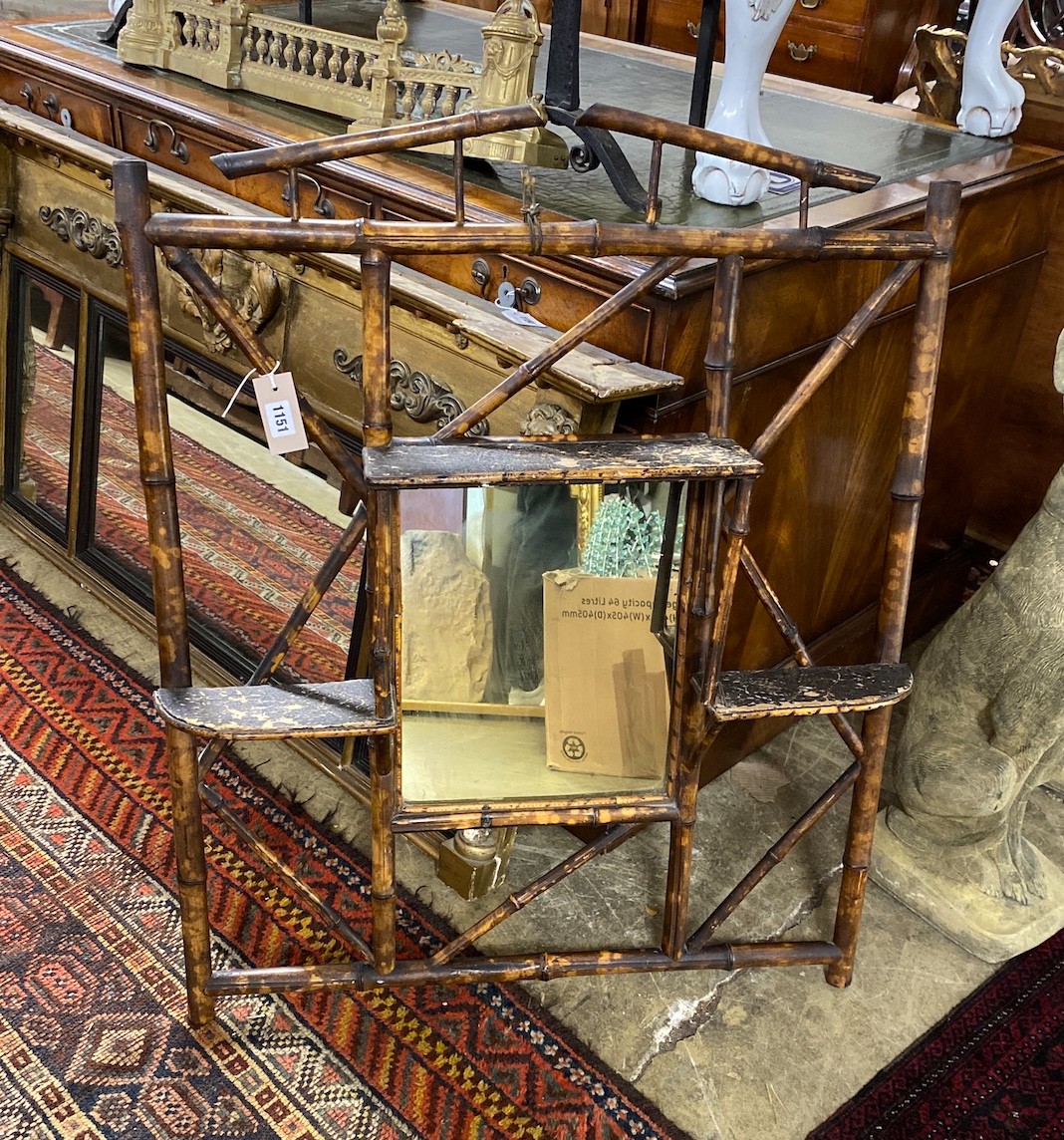A Victorian bamboo mirrored wall bracket, width 77cm, height 96cm